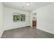Minimalist dining room offering view to back yard and kitchen at 4317 E Yucca St, Phoenix, AZ 85028