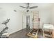 Bright exercise room features a ceiling fan and workout equipment at 4317 E Yucca St, Phoenix, AZ 85028