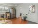 Eat-in kitchen with stainless steel refrigerator and wood floors at 4317 E Yucca St, Phoenix, AZ 85028