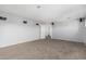 Open bonus room features carpeting, neutral paint and ceiling speakers at 4413 E Odessa Dr, San Tan Valley, AZ 85140