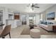 Inviting living room with neutral décor, plush seating, and a view to the outdoor patio at 4413 E Odessa Dr, San Tan Valley, AZ 85140