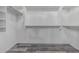 Spacious walk-in closet with shelving and hanging rods offers ample storage at 4413 E Odessa Dr, San Tan Valley, AZ 85140