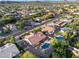 Community aerial view with a home featuring desert landscaping, a pool, and mountain views at 4637 W Misty Willow Ln, Glendale, AZ 85310