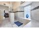 Elegant bathroom with a shower and a window with glass blocks for privacy at 4637 W Misty Willow Ln, Glendale, AZ 85310