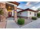Charming single-story home with brick pillars, mature landscaping, and a welcoming front entrance at 4637 W Misty Willow Ln, Glendale, AZ 85310