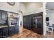 Beautiful kitchen featuring dark cabinetry, stainless appliances, and ample storage space at 4637 W Misty Willow Ln, Glendale, AZ 85310