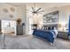 Main bedroom with a fireplace and large windows, offering a relaxing retreat at 4637 W Misty Willow Ln, Glendale, AZ 85310