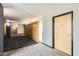 Modern hallway with elevator access, neutral decor, and sleek carpeting at 4808 N 24Th St # 1003, Phoenix, AZ 85016