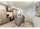 Kitchen space with gray cabinets, marble floors, stylish decor, and natural light at 4808 N 24Th St # 1003, Phoenix, AZ 85016