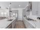 Gourmet kitchen with extended island, stainless appliances, and open layout, perfect for entertaining at 5228 S 106Th Pl, Mesa, AZ 85212