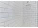 Bathroom shower showcasing white subway tile and a built-in niche at 5228 S 106Th Pl, Mesa, AZ 85212