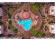 Stunning aerial view of the community pool with surrounding landscaping and buildings at 5450 E Deer Valley Dr # 1195, Phoenix, AZ 85054