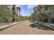 Well-maintained community entrance with landscaped median and attractive architecture at 5450 E Deer Valley Dr # 1195, Phoenix, AZ 85054