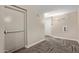 Neutral hallway with doors and herringbone carpet at 5450 E Deer Valley Dr # 1195, Phoenix, AZ 85054