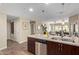 Bright kitchen featuring stainless steel appliances, tile backsplash, and an open layout flowing into the living area at 5450 E Deer Valley Dr # 1195, Phoenix, AZ 85054