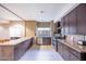 Modern kitchen with sleek appliances, granite countertops, and ample cabinet space at 5450 E Deer Valley Dr # 1195, Phoenix, AZ 85054