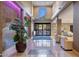 Grand lobby featuring tile flooring, a lush green plant, and a grand entrance at 5450 E Deer Valley Dr # 1195, Phoenix, AZ 85054