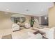 Bright lobby with tile floors, modern furniture, neutral paint, and recessed lighting at 5450 E Deer Valley Dr # 1195, Phoenix, AZ 85054