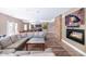 Relaxing lounge area with comfortable seating, modern fireplace, and a large TV at 5450 E Deer Valley Dr # 1195, Phoenix, AZ 85054