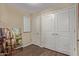 Neutral room with wood floors and white doors with brushed nickel hardware at 5450 E Deer Valley Dr # 1195, Phoenix, AZ 85054