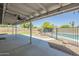 Large covered patio overlooking the pool and yard at 5944 W Greenbriar Dr, Glendale, AZ 85308