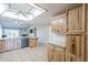 Open-concept kitchen with an island and plenty of storage, connecting the space to the living areas at 5944 W Greenbriar Dr, Glendale, AZ 85308