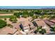 Wide aerial shot revealing a generous lot size, desert landscaping, and proximity to greenbelt at 5973 S Legend Dr, Gilbert, AZ 85298