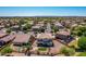 Overhead aerial view of a neighborhood featuring a two-story home with desert landscaping at 5973 S Legend Dr, Gilbert, AZ 85298