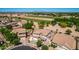 Aerial view of the neighborhood showcasing a two-story home and nearby horse property at 5973 S Legend Dr, Gilbert, AZ 85298