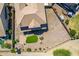 Aerial view of the backyard, featuring rock landscaping and a small patch of artificial turf at 5973 S Legend Dr, Gilbert, AZ 85298