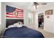 Comfortable bedroom with carpet, closet, ceiling fan and baseball themed decor at 5973 S Legend Dr, Gilbert, AZ 85298