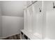 Mud room boasts built in cubbies and hooks to organize coats and accessories at 5973 S Legend Dr, Gilbert, AZ 85298