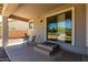 Covered patio with tile flooring, table and chairs at 5973 S Legend Dr, Gilbert, AZ 85298