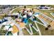 Overhead view of a playground with play structures, rock climbing, slides, and walking paths at 5973 S Legend Dr, Gilbert, AZ 85298