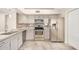 Well-equipped kitchen featuring granite countertops and stainless steel appliances at 6203 W Caribe Ln, Glendale, AZ 85306