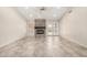 Large living room featuring neutral walls, a fireplace, and tile flooring, with great natural light at 6203 W Caribe Ln, Glendale, AZ 85306
