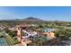 Resort-style community pool area with waterslide and mountain views at 6449 S Glory Ct, Gilbert, AZ 85298