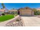 Beautiful single-story home with a well-maintained front yard and attached two-car garage at 7185 W Kimberly Way, Glendale, AZ 85308