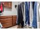 Walk-in closet offering ample storage space, and custom wood cabinetry at 7185 W Kimberly Way, Glendale, AZ 85308