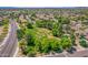 Sprawling community featuring lush green space, mature trees, and access to local parks and amenities at 7236 W Aurora Dr, Glendale, AZ 85308
