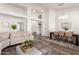 Open-concept living and dining area with abundant natural light and stylish furnishings at 7236 W Aurora Dr, Glendale, AZ 85308