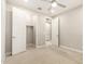 Bedroom features neutral carpet, a closet and a doorway to the hallway at 7251 E Portobello Ave, Mesa, AZ 85212