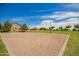 A sand volleyball court is easily accessible to the surrounding neighborhood at 7251 E Portobello Ave, Mesa, AZ 85212
