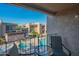 Scenic view from the balcony overlooking the pool and hot tub area, perfect for outdoor relaxation at 7436 E Chaparral Rd # B246, Scottsdale, AZ 85250