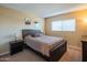 Cozy bedroom with a full-size bed, a nightstand on each side, and neutral decor creating a relaxing atmosphere at 7436 E Chaparral Rd # B246, Scottsdale, AZ 85250