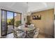 Cozy dining area with sliding glass door to the patio at 7512 N Via Camello Del Sur --, Scottsdale, AZ 85258