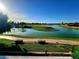 Scenic golf course view with a winding lake and manicured green, perfect for a relaxing day outdoors at 7512 N Via Camello Del Sur --, Scottsdale, AZ 85258