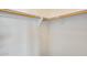 Walk-in closet with rods, neutral paint, and ample storage space at 9165 W Mine Trl, Peoria, AZ 85383