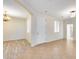 Bright living room with wood flooring, neutral paint, and natural light from the windows at 9165 W Mine Trl, Peoria, AZ 85383