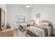 Cozy twin bedroom featuring matching beds, shuttered windows, and a neutral color scheme at 10335 E Morning Star Dr, Scottsdale, AZ 85255
